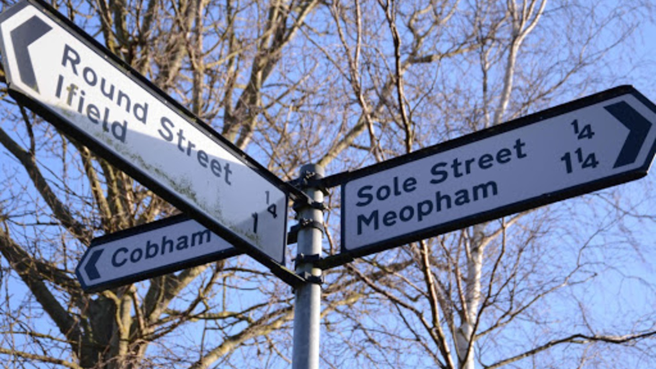 street sign round street